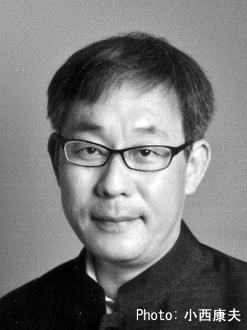 当摩　泰久の肖像写真